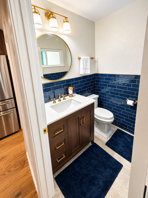 Downstairs Half Bath Remodel | Rich Blue Tile & Brass Finishes